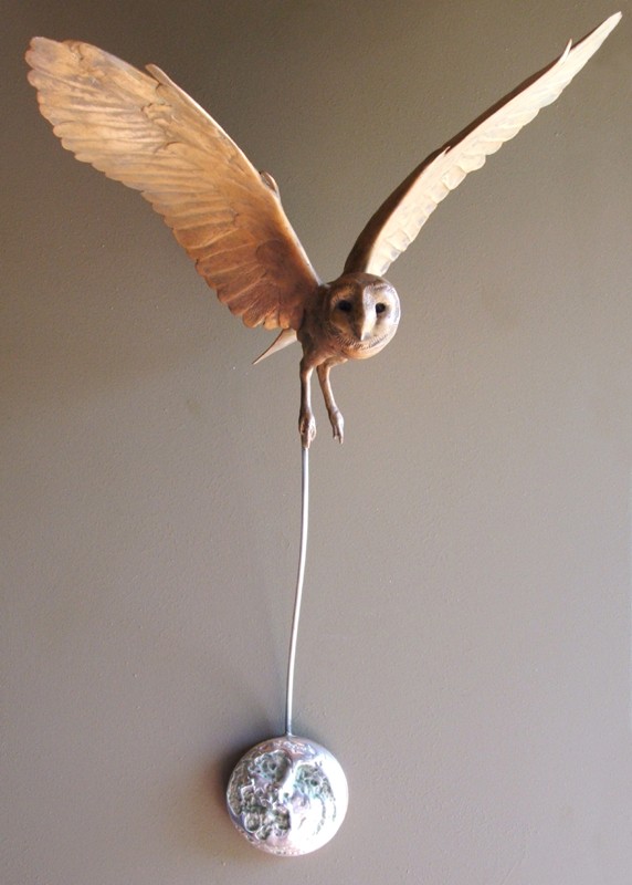 ... this ghostly spirit hovers above the moon ... (Click to enlarge)